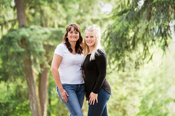 Two Armstrong Dental Centre team members, photographed outdoors