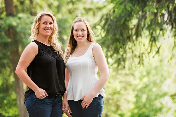 Two Armstrong Dental Centre team members, photographed outdoors